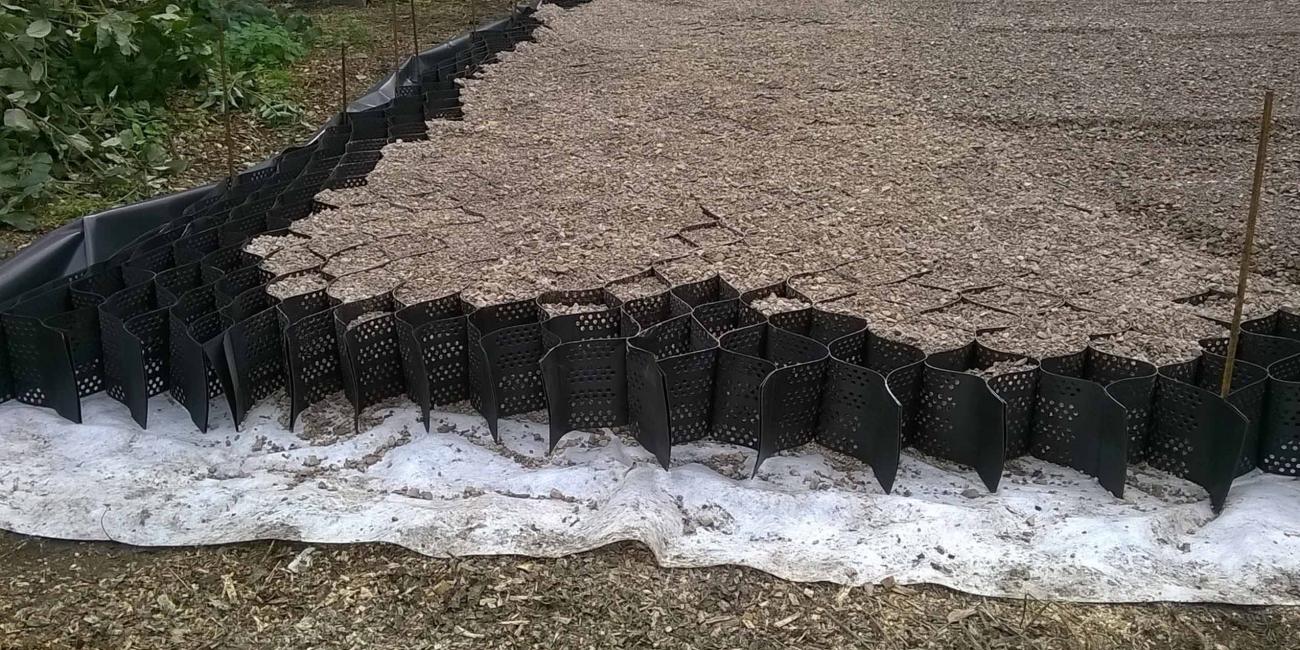 ProtectaWeb cells filled with stone aggregate providing tree root protection